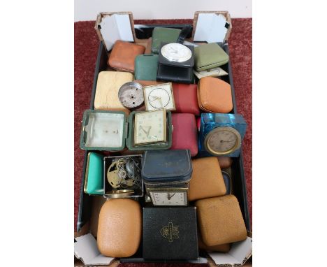 Smiths 8 day travel clock alarm and a large selection of other travelling alarm clocks contained in one box 