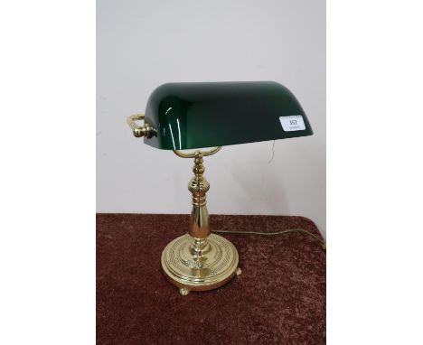 Brass desk lamp with green opaque glass shade 