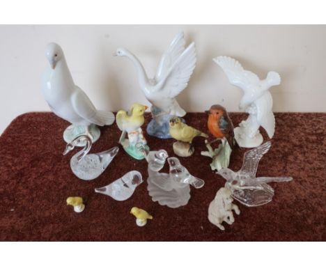 A Goebel china model of a robin, two Nao birds and a small selection of other decorative ceramic and glass bird ornaments 