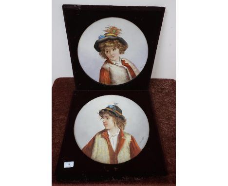 Pair of framed/mounted circular porcelain plaques depicting portrait of a young boy in Austrian style dress signed Danrius (4
