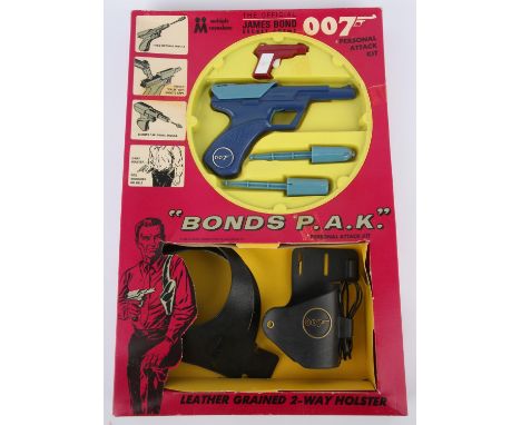 James Bond 007. Multiple Toymakers Bond's P.A.K. (Personal Attack Kit), 1966. Includes dart gun pistol with two darts, small 