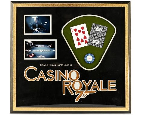 James Bond: Casino Royale (2006) Casino Chip Prop Display$500 casino chip and 2 playing cards, Mounted with respective stills