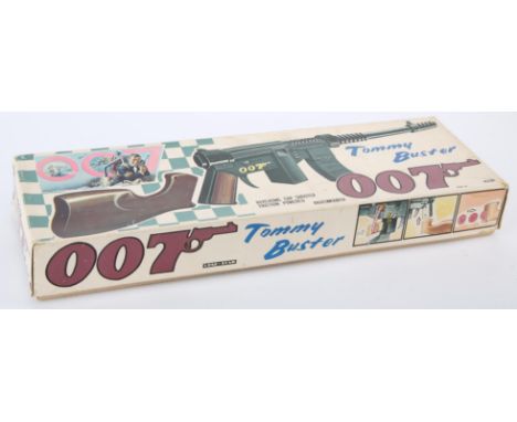 James Bond 007, 'Tommy Buster', friction powered cap shooter by Tada, Japan, C.1965, distributed by Lone Star, boxed.