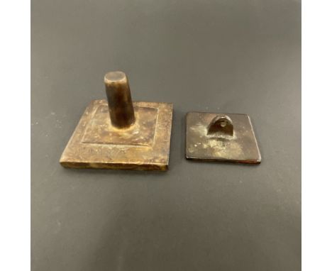 Two Chinese bronze scholar's seals, largest 7.5 x 7.5 x 6cm.