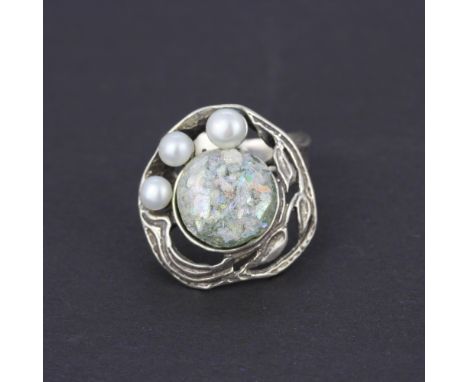 A 925 silver ring inset with a piece of Roman glass and pearls, (N). With certificate.