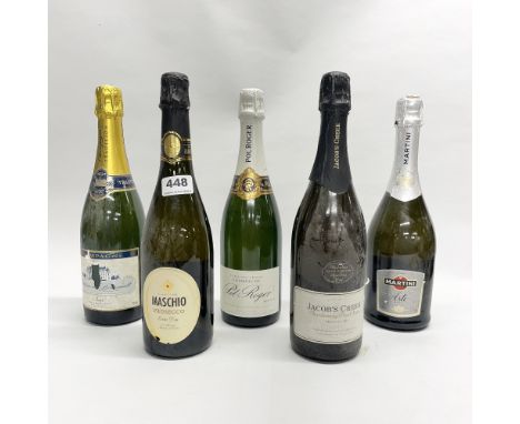 Five bottles of vintage and contemporary champagne and sparkling wine.