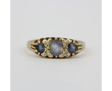 A yellow metal (tested minimum 9ct gold) ring set with ceylon sapphires and diamonds, (O).