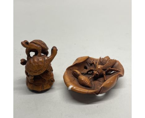 A Chinese carved fruitwood netuke of four young turtles on their mother, together with a further netsuke of a cicada on a lea