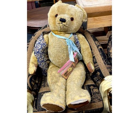 A very large Chad Valley articulated teddy bear (formerly a shop window display item for Bear Brand stockings) the lot includ