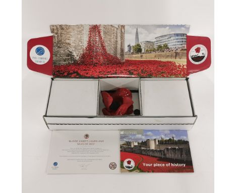 A boxed Paul Cummings Tower of London ceramic poppy.