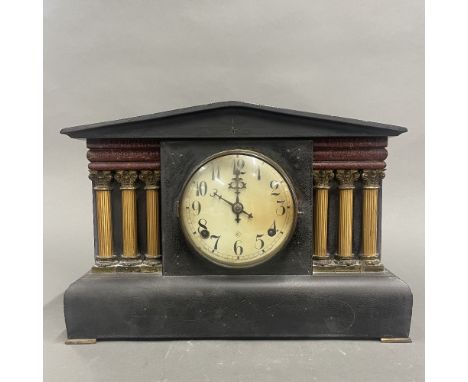 A 19th century classical wooden mantle clock. W. 41cm. H. 29cm.