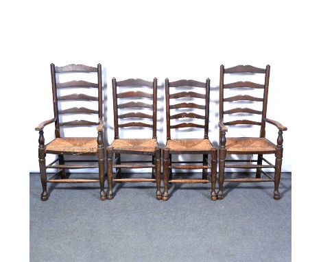 Set of six ash ladder-back chairs, rush seats, turned legs and rails, including two elbow chairs, width 53cm, height 111cm, a