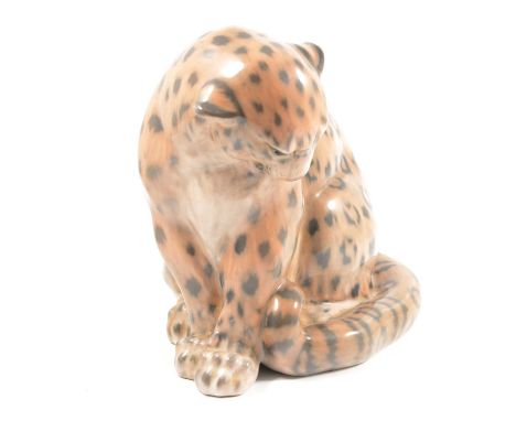 Royal Copenhagen, a Preening Leopard, model 2555, designed by Knud Kyhn, factory marks, 21cm.Condition report:The item is in 