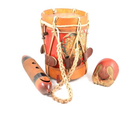 Box of instruments, including bugle, small drum, guiro, etc.