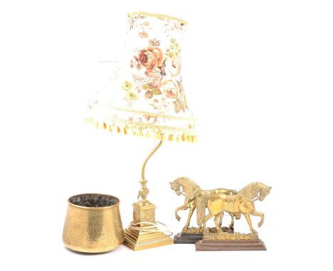 Brass table lamp, 43cm; pair of brass and cast iron horse doorstops, 24cm high; and an Eastern brass jardiniereQty: 4