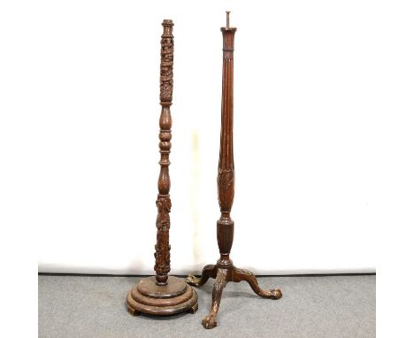 Mahogany standard lamp, Georgian style, 132cm, and an Eastern hardwood standard lamp, carved decoration, 135cm.Qty: 2