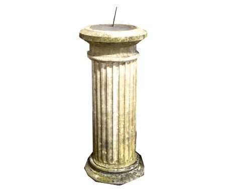 Haddonstone garden sundial, brass dial on a fluted column, circular plinth, height overall 119cm.Condition report:There are s