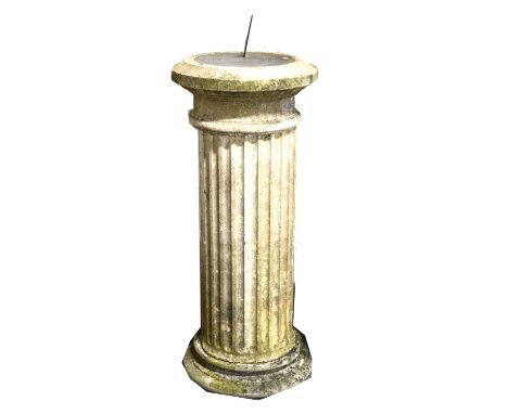 Haddonstone garden sundial, brass dial on a fluted column, circular plinth, height overall 119cm.Condition report:There are s