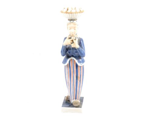 Royal Copenhagen, The Woman and the Eggs, model 4418, designed by Johannes Hedegaard, factory marks, 31.5cm.Condition report: