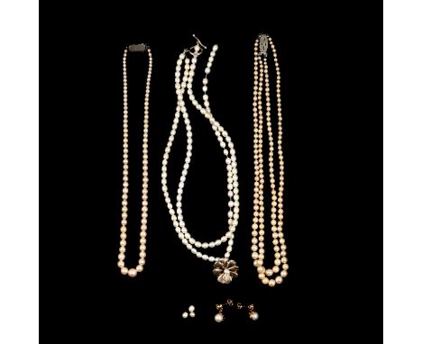 Three cultured pearl necklaces, a string of cultured pearls graduating from 3mm to 8mm, 45cm long fitted with a marcasite cla