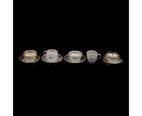 Collection of English early 19th century porcelain tea bowls, tea cups, and saucers, some with wrythen bodies.Qty: 18
