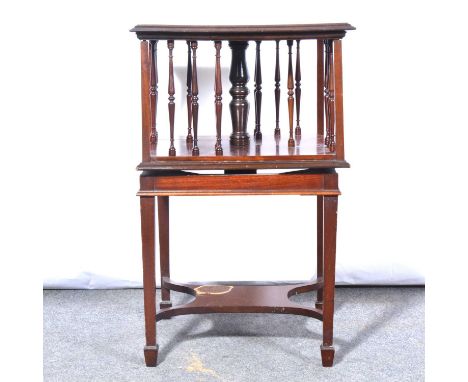 Edwardian inlaid mahogany revolving bookcase, square top, spindle sides, square tapering legs joined by shaped stretcher, 45x