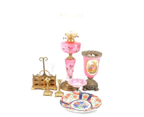 Victorian oil lamp with pink floral reservoir and column, urn with metal rim and base; pink and white glass pedestal dish, me