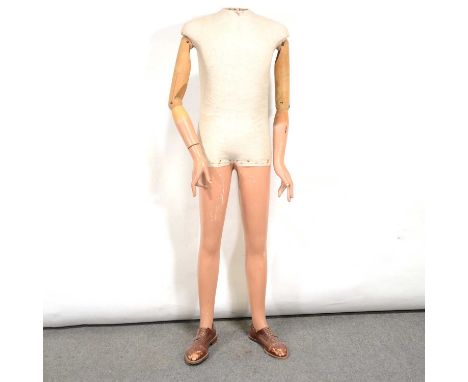 Mid-20th century mannequin, adjustable wooden arms, height 154cm.