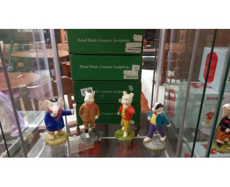 Four boxed John Beswick Rupert figures - Rupert Bear, Edward Trunk, Bill Badger and Podgy Pig.