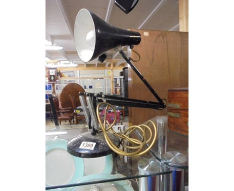 A vintage angle poise lamp.