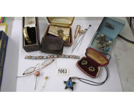 A mixed lot including micro mosaic bracelet, gold plated bangle, gold rimmed specs, hat pins etc.,