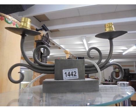 A wrought iron table lamp.