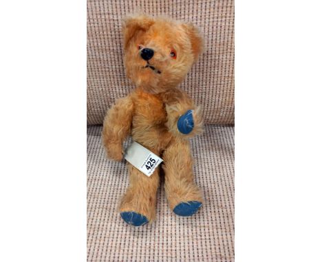 A vintage musical Teddy Bear with moving head (in working order)