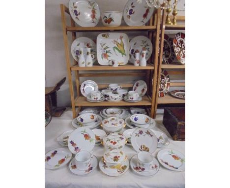 In excess of fifty pieces of pieces of Royal Worcester Evesham pattern table ware. COLLECT ONLY.