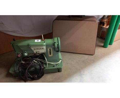 A cased vintage Singer sewing machine COLLECT ONLY