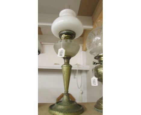 An old oil lamp with frosted glass font and opaque glass shade. COLLECT ONLY.