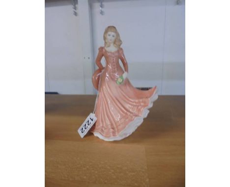 A Royal Worcester figurine - Floral Laidies 'October'.