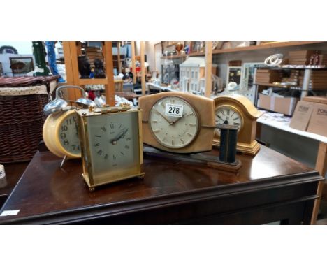 A vintage Metamec mantle clock and 3 other clocks