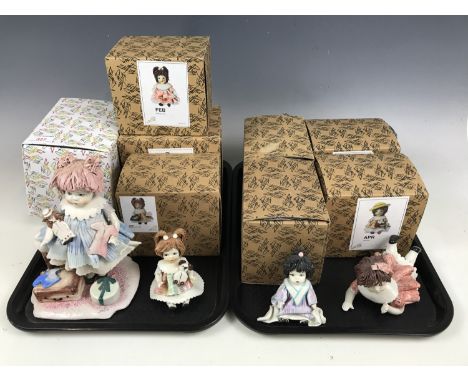 Eight Zampiva boxed ceramic dolls together with four others