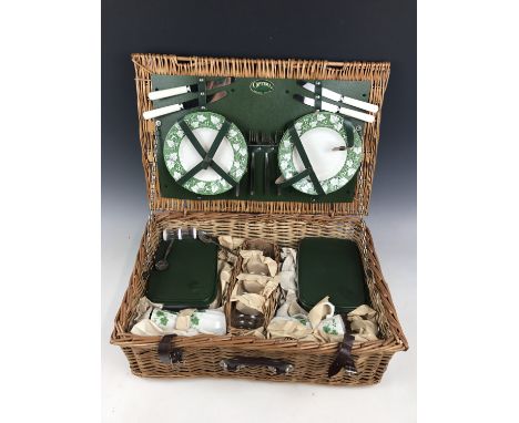 A traditional Optima wicker picnic hamper with crockery etc.