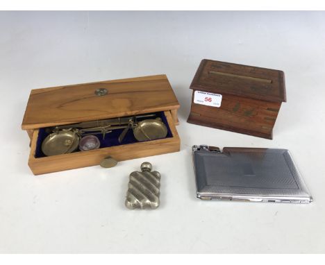 Sundry collectors' items including a brass-inlaid cigarette dispenser, a Tiki combination cigarette case / lighter, a perfume