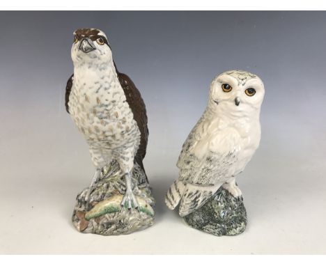 A Royal Doulton snowy owl together with an osprey decanter