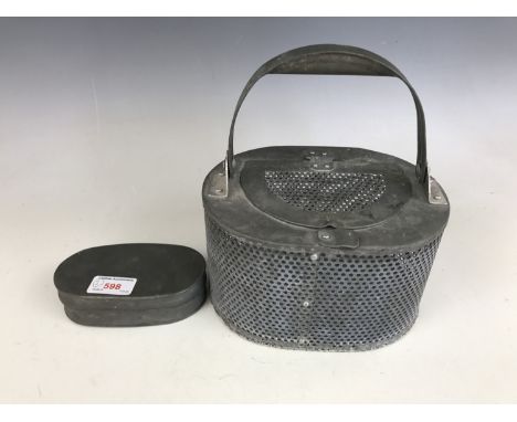 A vintage live bait box and fly tin