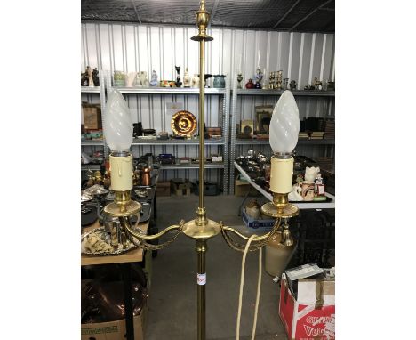 A reproduction brass standard lamp