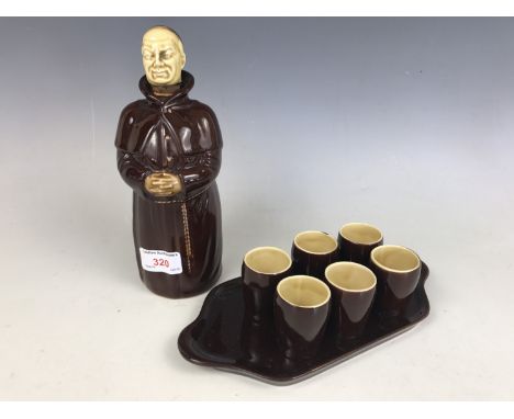 A Beswick ceramic monk decanter together with six shot glasses for Heatmaster (tray a/f)