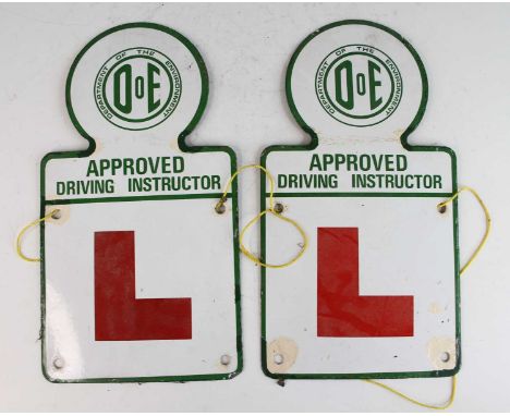 A pair of enamel learner plate signs, from the Department fo the Environment Approved Driving Instructor, each 35.5 x 19cm 