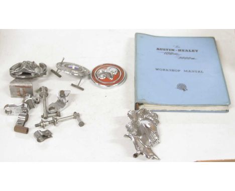 A small number of vintage car badges, to include a visored helmet, Viking, and an Austin Healey 100 series BN4 and BN6 and 30