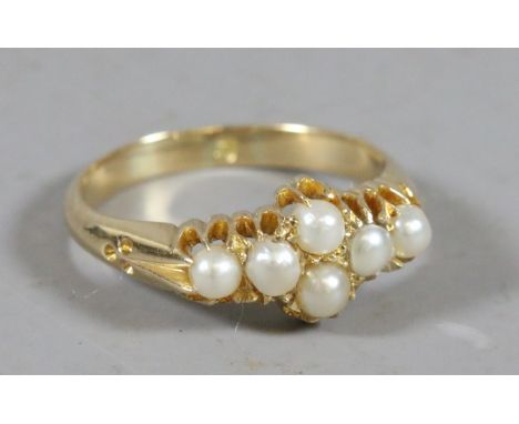 A ladies high carat gold Victorian pearl ring. UK size O.