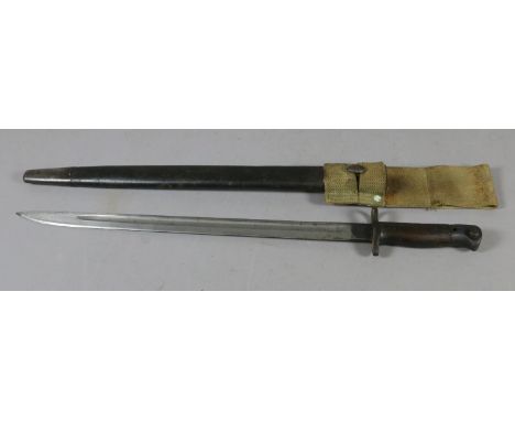 A British 1907 pattern sword bayonet in leather mounted metal scabbard and with canvas frog, broad arrow mark and proof marks