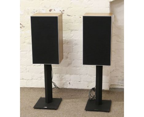 A pair of Leak 2030 loud speakers together with a pair of Apollo speaker stands.